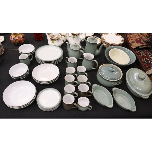 129 - Denby dinner and coffee service of thirty-nine pieces in the Regency Green colourway. Not available ... 