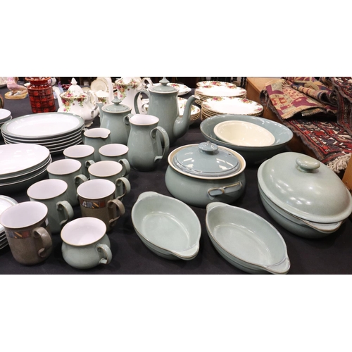 129 - Denby dinner and coffee service of thirty-nine pieces in the Regency Green colourway. Not available ... 