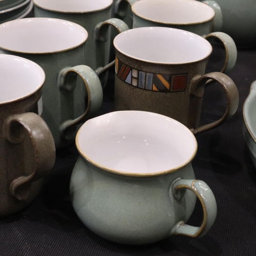129 - Denby dinner and coffee service of thirty-nine pieces in the Regency Green colourway. Not available ... 