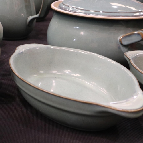 129 - Denby dinner and coffee service of thirty-nine pieces in the Regency Green colourway. Not available ... 