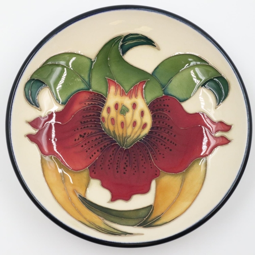 136 - Moorcroft coaster in the Anna Lily pattern, no cracks or chips, D: 12 cm. UK P&P Group 2 (£24+VAT fo... 