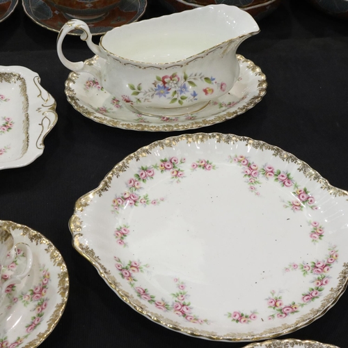 137 - Royal Albert tea service of seventeen pieces in the Dimity Rose pattern. Not available for in-house ... 