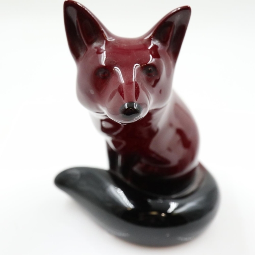 144 - Royal Doulton flambé sitting fox, no cracks or chips, H: 12 cm. UK P&P Group 2 (£24+VAT for the firs... 