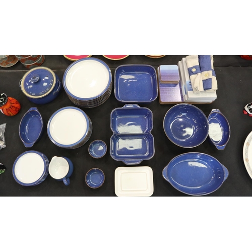 146 - Denby dinner service of thirty-two pieces in the Imperial Blue colourway with matching Denby placema... 