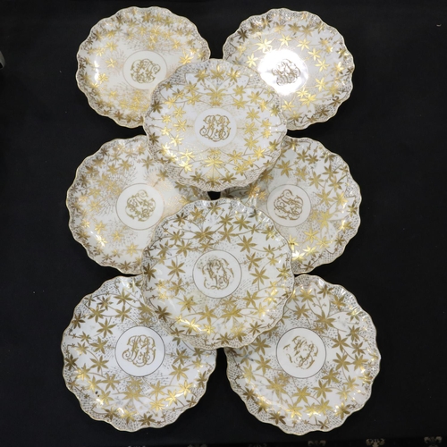153 - Set of eight Austrian scalloped edge gilt decorated plates for Higgins & Seiter New York, c1904, D: ... 
