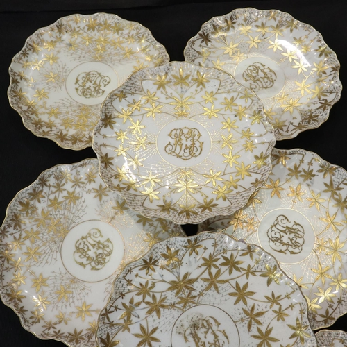 153 - Set of eight Austrian scalloped edge gilt decorated plates for Higgins & Seiter New York, c1904, D: ... 
