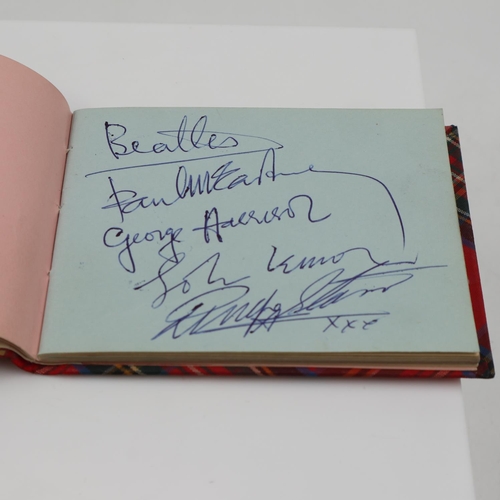 267 - The Beatles: an autograph book containing autographs of John Lennon (likely by George Harrison), Pau... 
