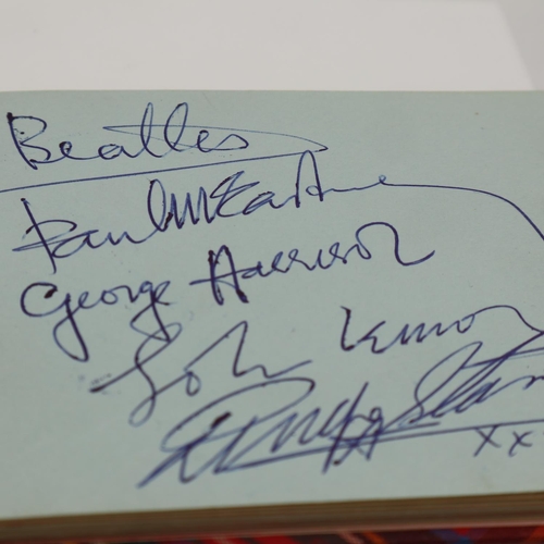 267 - The Beatles: an autograph book containing autographs of John Lennon (likely by George Harrison), Pau... 