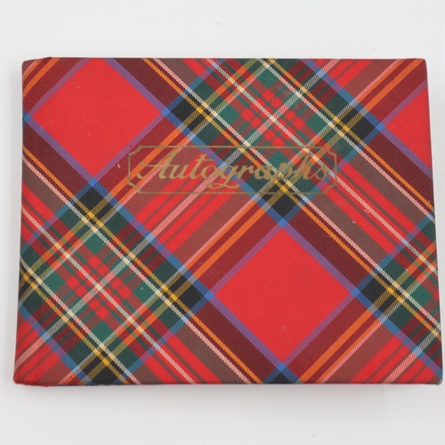 267 - The Beatles: an autograph book containing autographs of John Lennon (likely by George Harrison), Pau... 