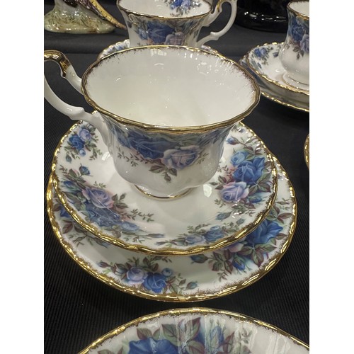 163 - Royal Albert tea service of twenty three pieces in the Moonlight Rose pattern. All pieces are first ... 