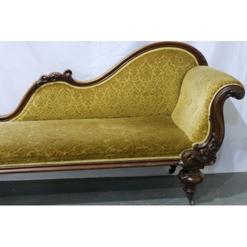 2023 - Victorian heavily carved and upholstered chaise longue, walnut framed with oversized bulbous support... 
