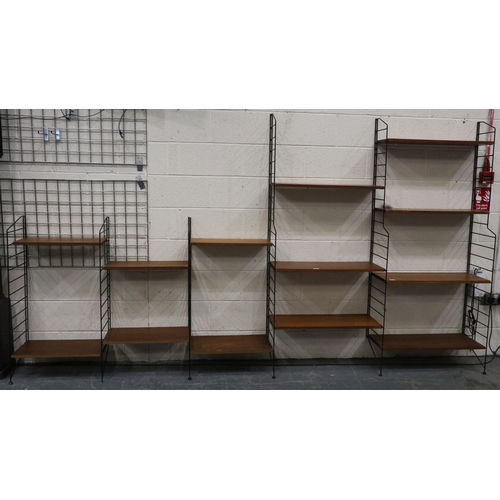 2012 - Mid 20th century modular bookcase in the manner of Ladderrax, comprising six upright supports and sh... 