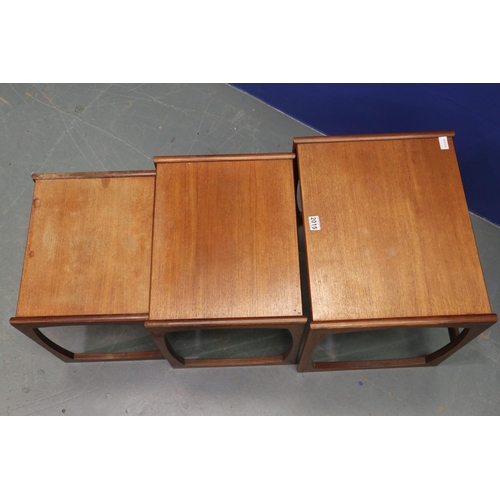 2015 - G-Plan nest of three graduating teak tables, largest 54 x 44 x 49cmH. Some marks, fading and surface... 