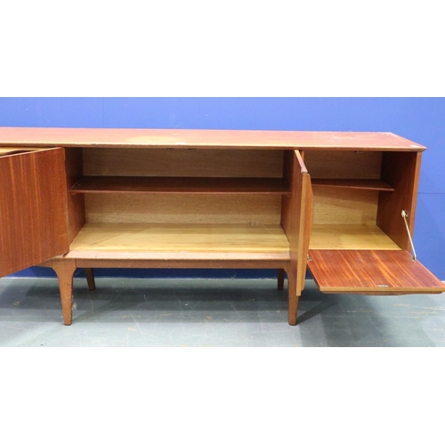 2019 - Jentique Scandinavian style teak asymmetric sideboard, having drop-front and hinged cupboard doors b... 