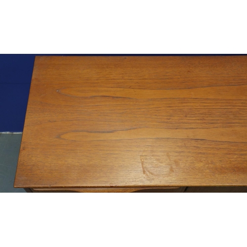 2019 - Jentique Scandinavian style teak asymmetric sideboard, having drop-front and hinged cupboard doors b... 