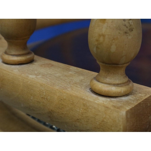 2029 - A modern light elm framed desk chair in the Chesterfield style, revolving and supported on a five-sp... 