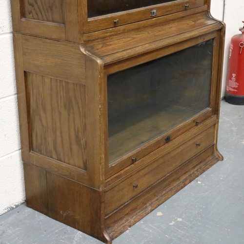 2031 - The Lebus Bookcase, modular in the style of Globe Wernicke and glazed, comprising eight pieces inclu... 