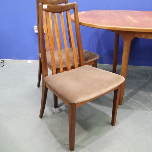 2041 - Leslie Dandy designed for G Plan, a set of four teak framed dining chairs, with an oval extending te... 
