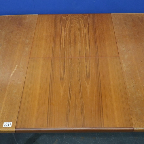 2041 - Leslie Dandy designed for G Plan, a set of four teak framed dining chairs, with an oval extending te... 