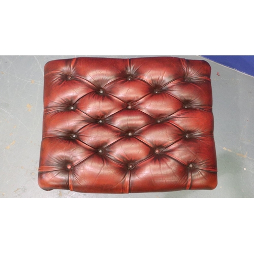 2051 - 20th century Chesterfield style footstool, studded and buttoned ox-blood red leather over a mahogany... 