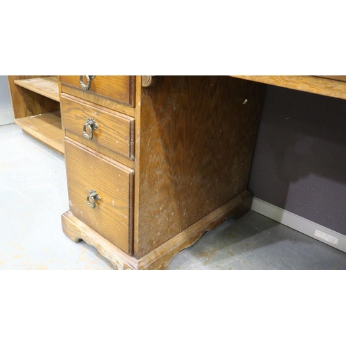 2053 - 20th century oak twin pedestal writing desk, twin pedestal with carved detail to top-drawer facias a... 