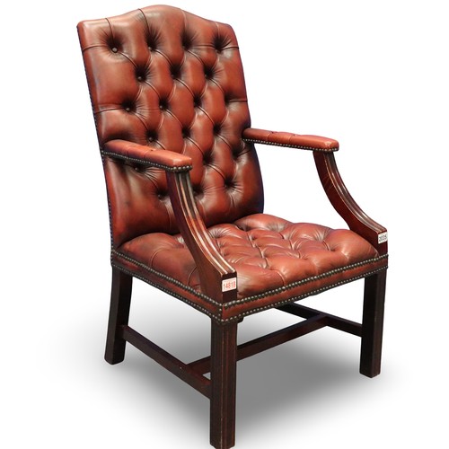 2035 - 20th century Chesterfield style gentleman's elbow chair, upholstered in ox-blood red leather with bu... 