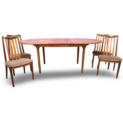 2041 - Leslie Dandy designed for G Plan, a set of four teak framed dining chairs, with an oval extending te... 
