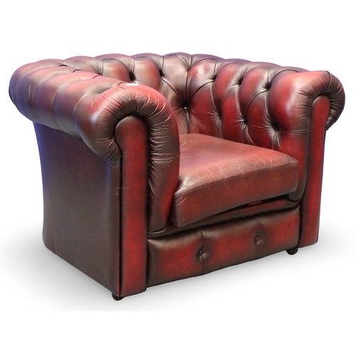 2049 - A Chesterfield club armchair in ox-blood red leather. Not available for in-house P&P