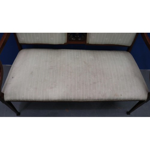 2025 - An Edwardian two-seat settee, inlaid walnut frame with upholstered and carved backrest, raised on ta... 