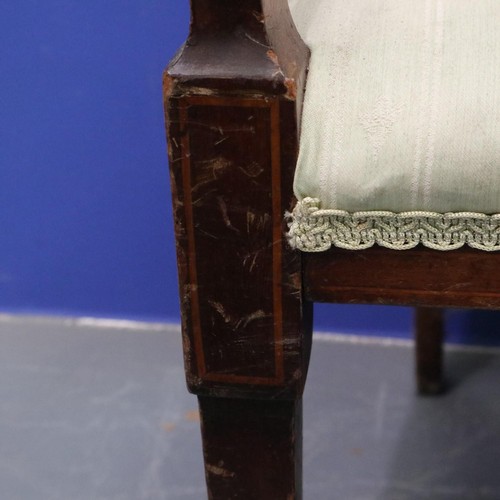 2025 - An Edwardian two-seat settee, inlaid walnut frame with upholstered and carved backrest, raised on ta... 