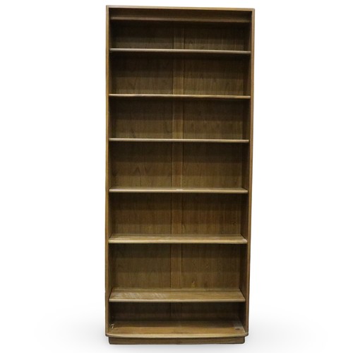 2054 - Ercol Golden Dawn elm bookcase having six fixed shelves. Not available for in-house P&P