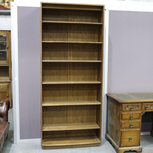 2054 - Ercol Golden Dawn elm bookcase having six fixed shelves. Not available for in-house P&P