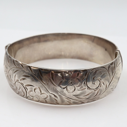 103 - 1970s hallmarked silver engraved bangle, D: 60 mm. UK P&P Group 1 (£18+VAT for the first lot and £2+... 