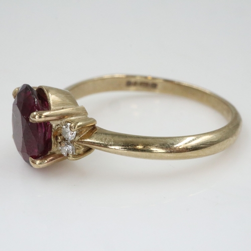 39 - 9ct gold fire garnet and diamond set ring, size O, 2.6g. UK P&P Group 0 (£7+VAT for the first lot an... 
