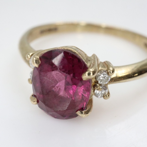 39 - 9ct gold fire garnet and diamond set ring, size O, 2.6g. UK P&P Group 0 (£7+VAT for the first lot an... 