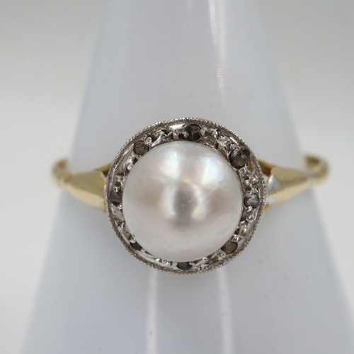 5 - Vintage 9ct gold pearl set ring, surrounded by a halo of diamonds, size M, 1.2g. UK P&P Group 0 (£7+... 