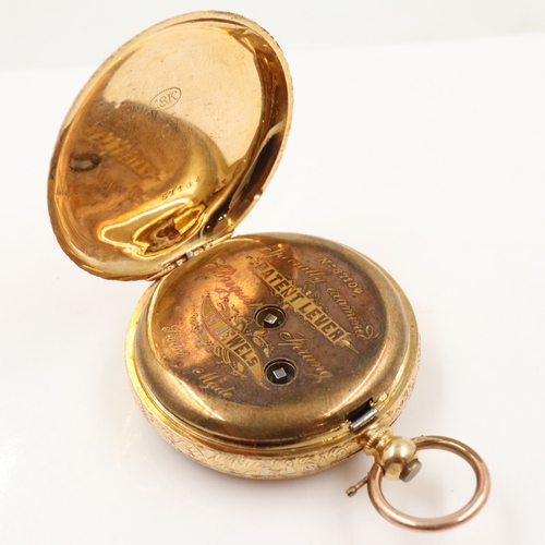 165 - 18ct fob watch, with fifteen jewel movement, chased dial and roman charters, base metal dust cover, ... 