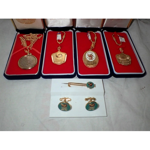 1083 - Four cased Olympiad key holders from 1983-1988 and Seoul 1998 cufflink set. Not available for in-hou... 