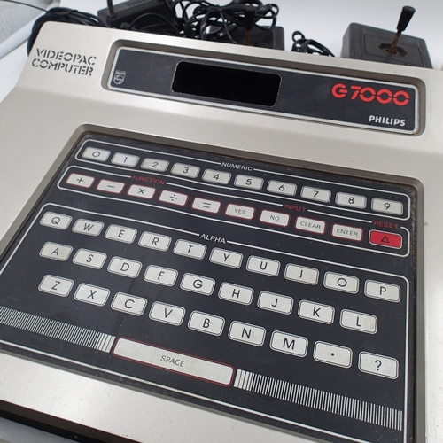 Philips videotape console G7000, ten Videopac games, and a 1986 Cruiser ...