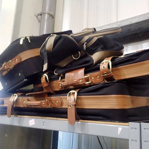 1190 - Set of four Antler luggage carriers. Not available for in-house P&P
