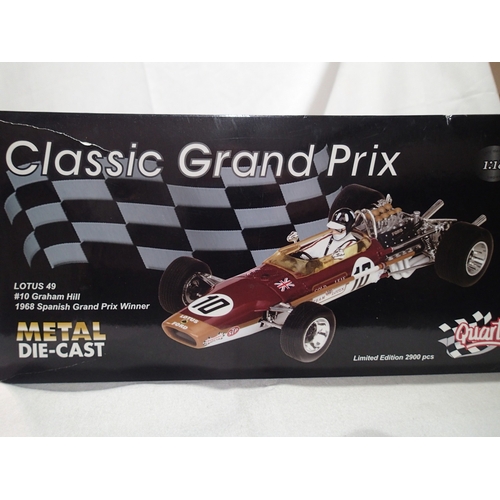 253 - Quartzo 1/18 scale Lotus 49 Gold Leaf, No 10, Graham Hill, 1968 Spanish Grand Prix winner, excellent... 