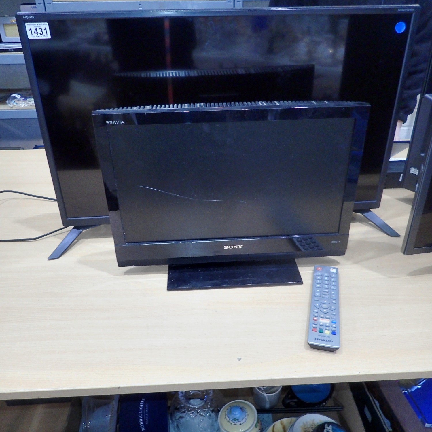 Sharp 32 inch TV with remote and Sony monitor. All electrical items in ...