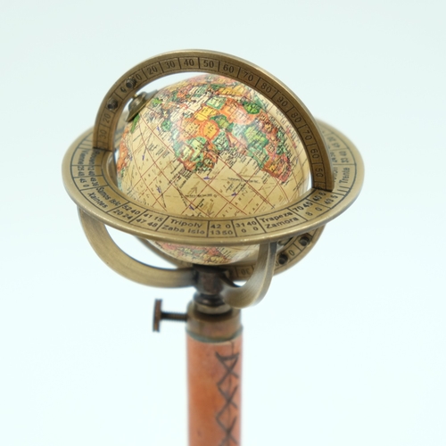 252 - Small world globe on leather and brass stand, H: 30 cm.  UK P&P Group 1 (£18+VAT for the first lot a... 