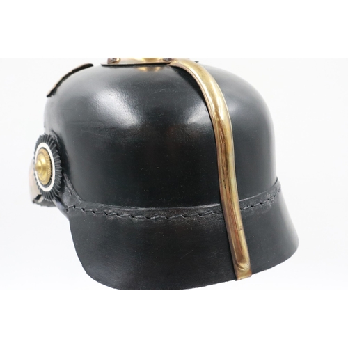 2051 - Replica WWI pickelhaube, badged to the Imperial Prussian Garde Korps Regiment, lacking spike. UK P&P... 