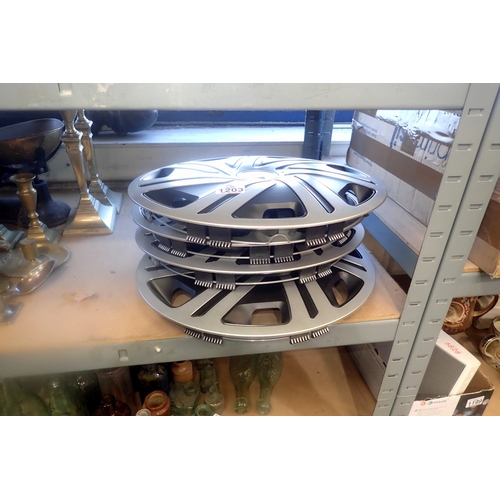 1203 - Four car trims, D: 40 cm. Not available for in-house P&P