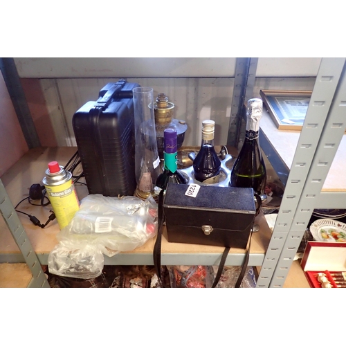 1220 - Mixed items including a portable camping stove, Aladdin paraffin lamp, wine rack, mixed bottles and ... 