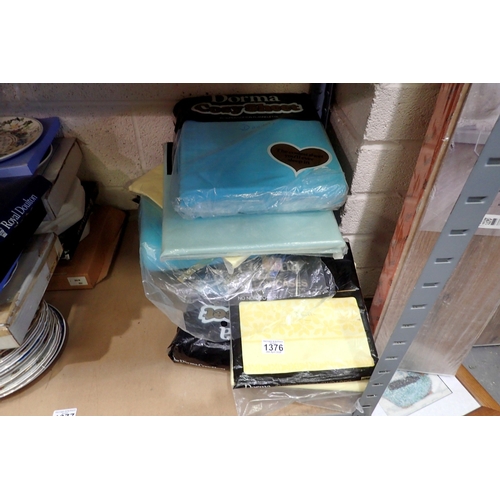 1376 - Seven new in  packaging Dorma sheets and pillowcases. Not available for in-house P&P