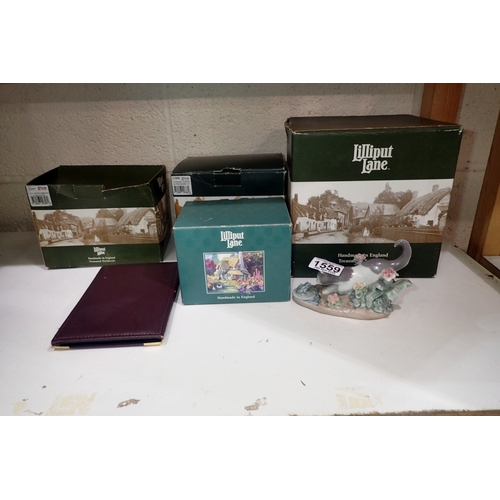 1559 - Four boxed Liliput Lane cottages and Lladro cat. Not available for in-house P&P
