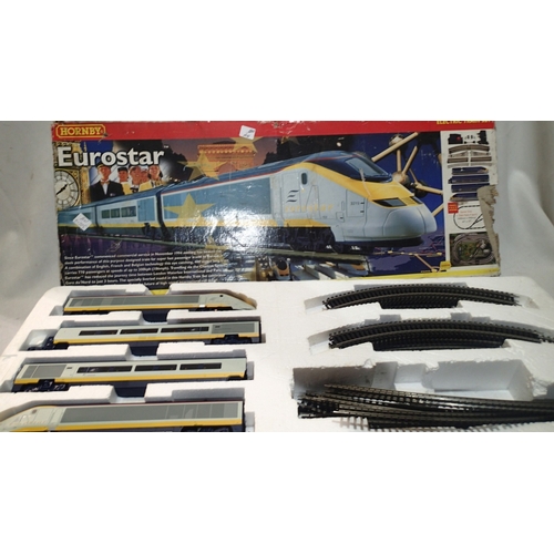 2065 - Hornby R1013 Eurostar train set, missing one pantograph arm, trackmat, paperwork, box with damage. U... 