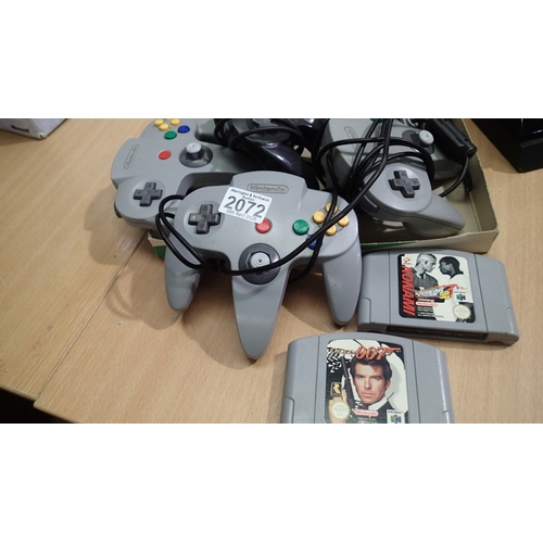 2072 - Nintendo N64, four wired controllers and two game cartridges, 007 Goldeneye and International Supers... 